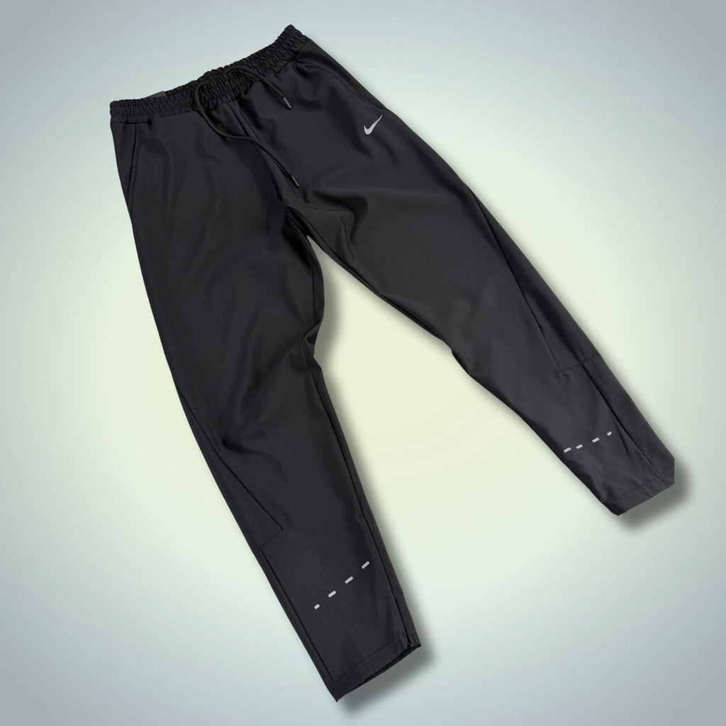 Nike pánské nepromokavé sportovní kalhoty, černé. Prémiová kvalita