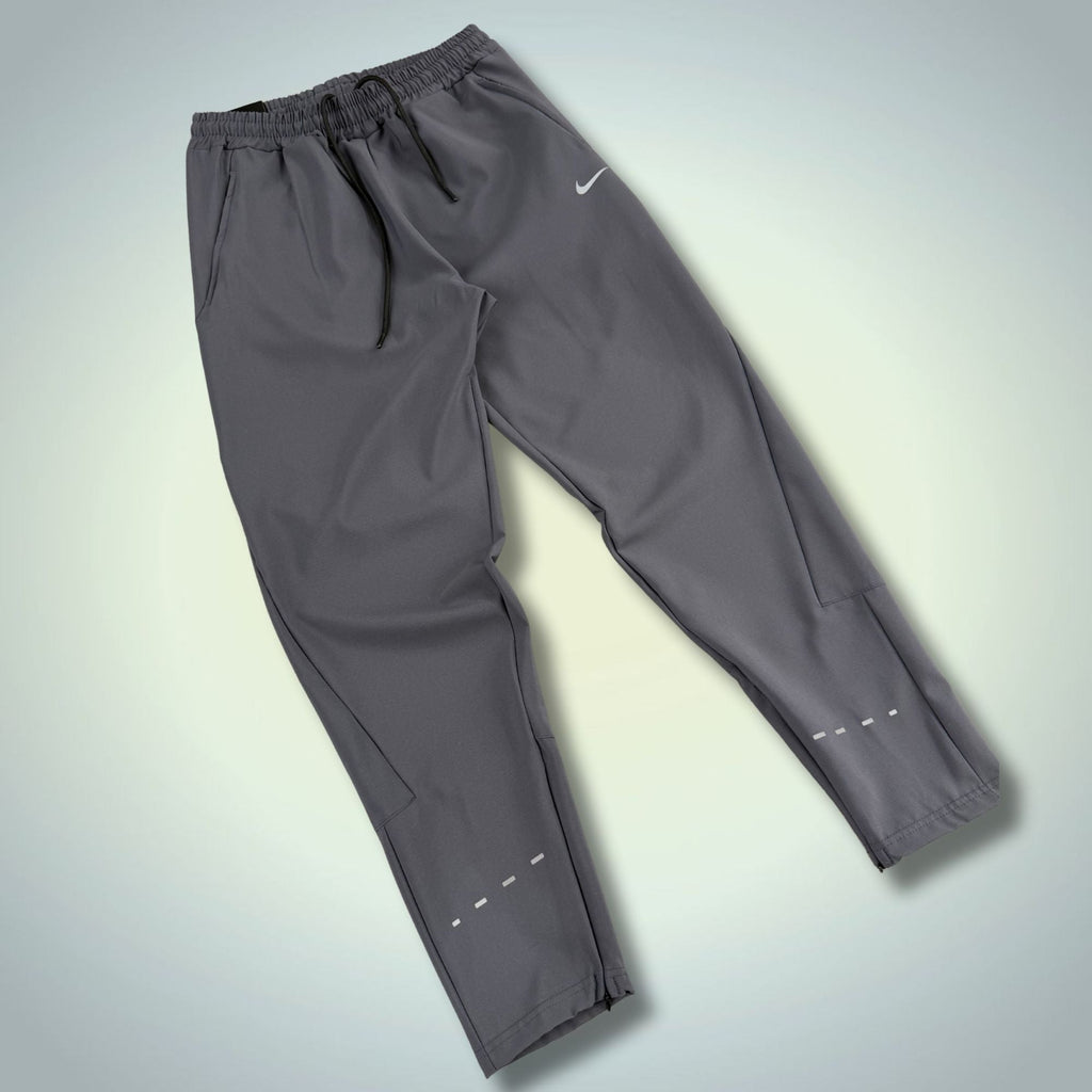 Nike pánské nepromokavé sportovní kalhoty, grafitové. Prémiová kvalita