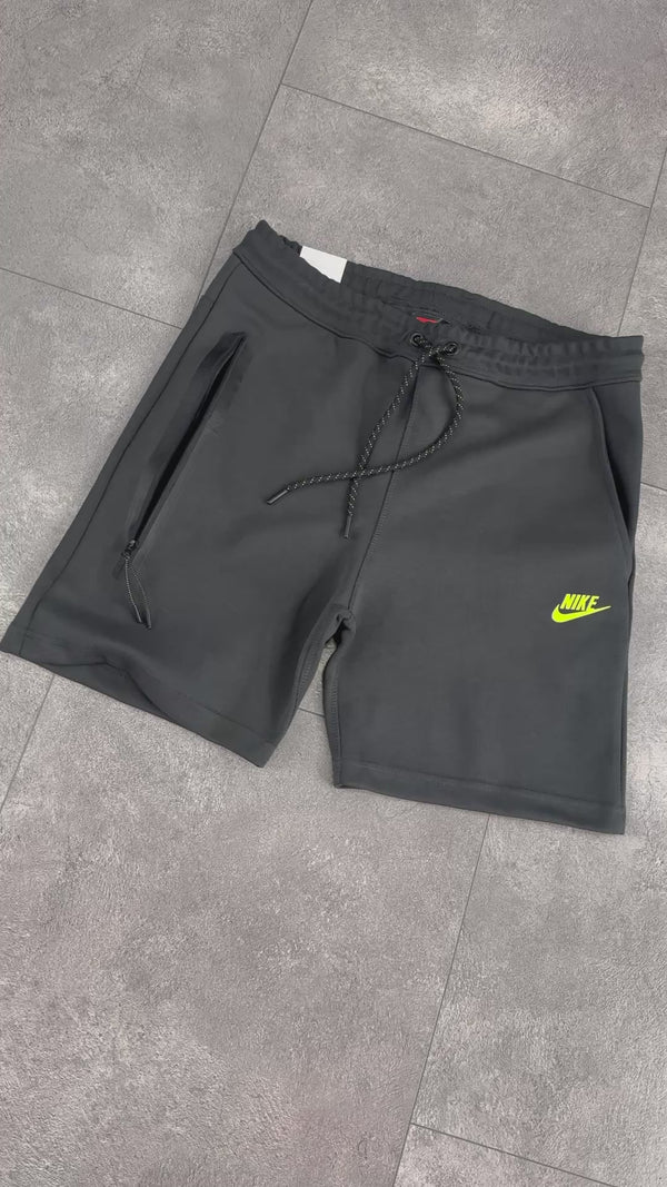 Pánské šortky Nike Tech Fleece, grafitové, neonově zelené logo. Model 2024. Prémiová kvalita